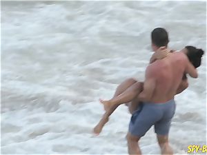 pink swimsuit first-timer topless spycam Beach damsels