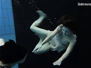 two dolls swim and get bare beautiful